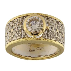 Anello fascia in oro giallo e bianco con diamanti