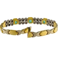Bracciale in oro giallo e bianco con smeraldi e brillanti