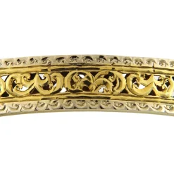 Bracciale rigido in oro giallo e bianco