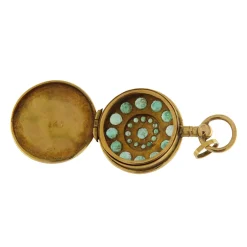 Ciondolo portapillole in oro giallo con smeraldi