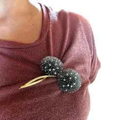 Spilla floreale in oro giallo e bianco con diamanti